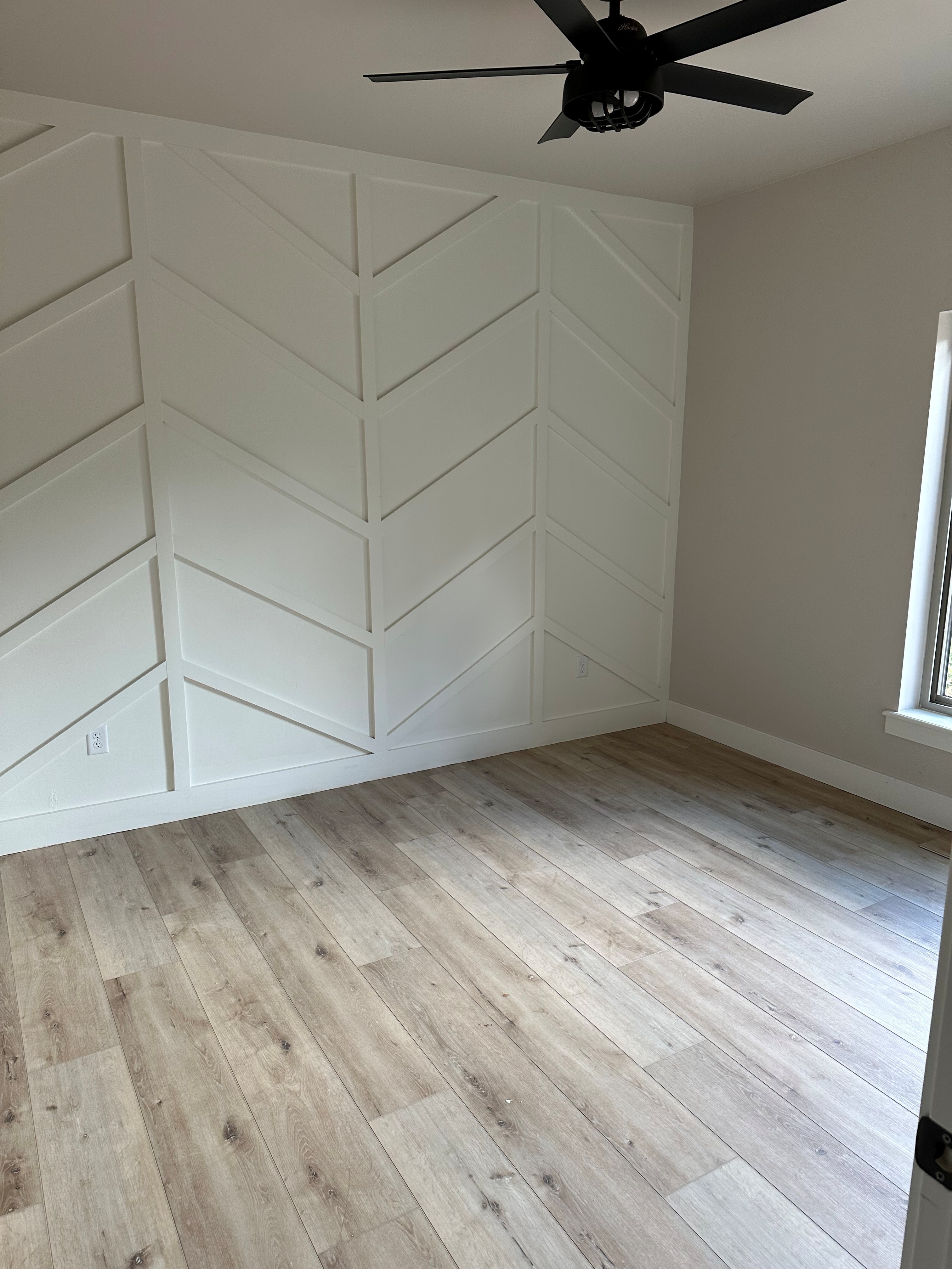 Geometric accent wall with finished trim work